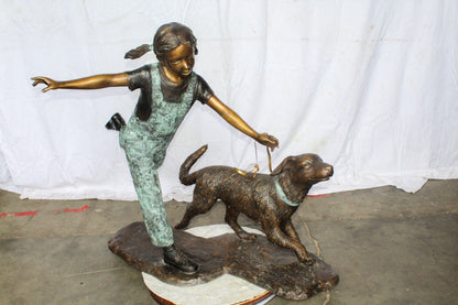 Young Girl and Her Dog Playing Bronze Statue 53" x 21" x 40"H