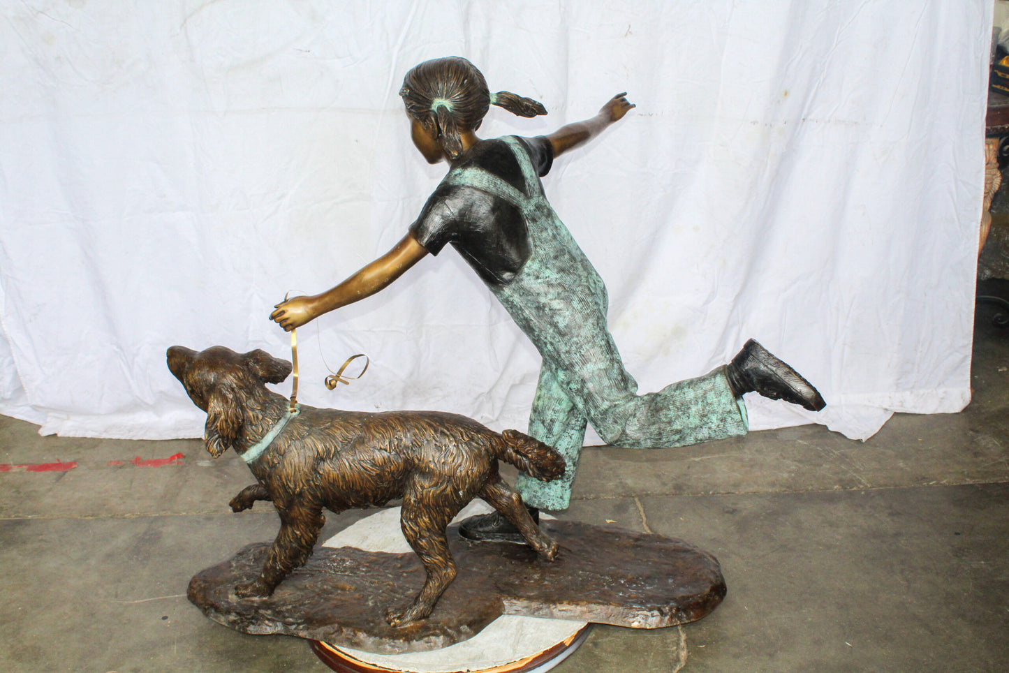 Young Girl and Her Dog Playing Bronze Statue 53" x 21" x 40"H