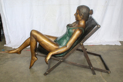 Life Size Bronze Statue of a Lady Sitting on a Beach Chair 64" x 25" x 38"H