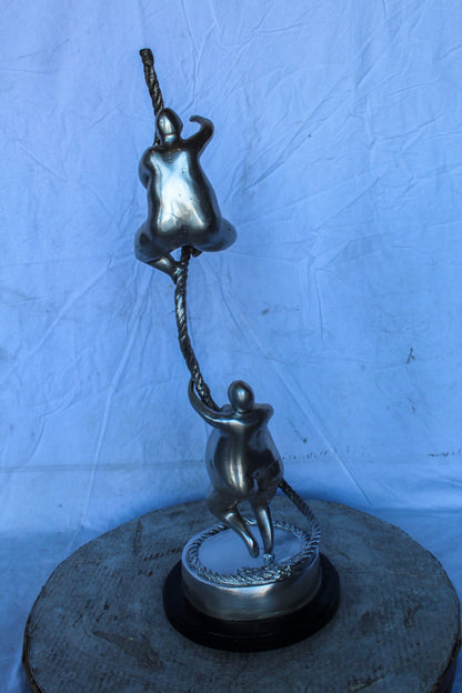 Two Voluptuous Women Climbing a Rope Statue, Silver Finish 10" x 10" x 29"H