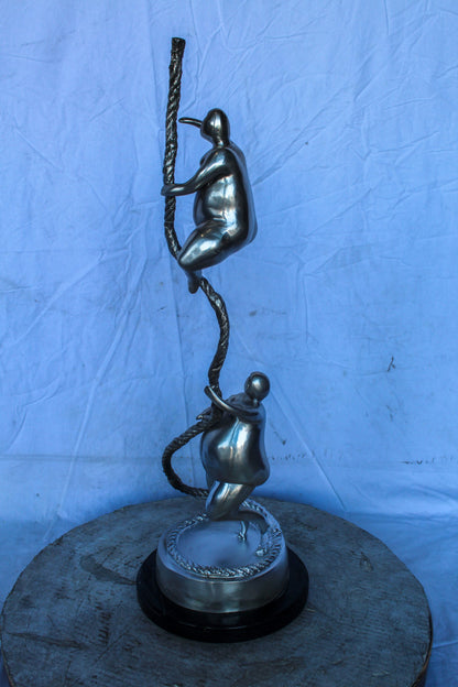 Two Voluptuous Women Climbing a Rope Statue, Silver Finish 10" x 10" x 29"H