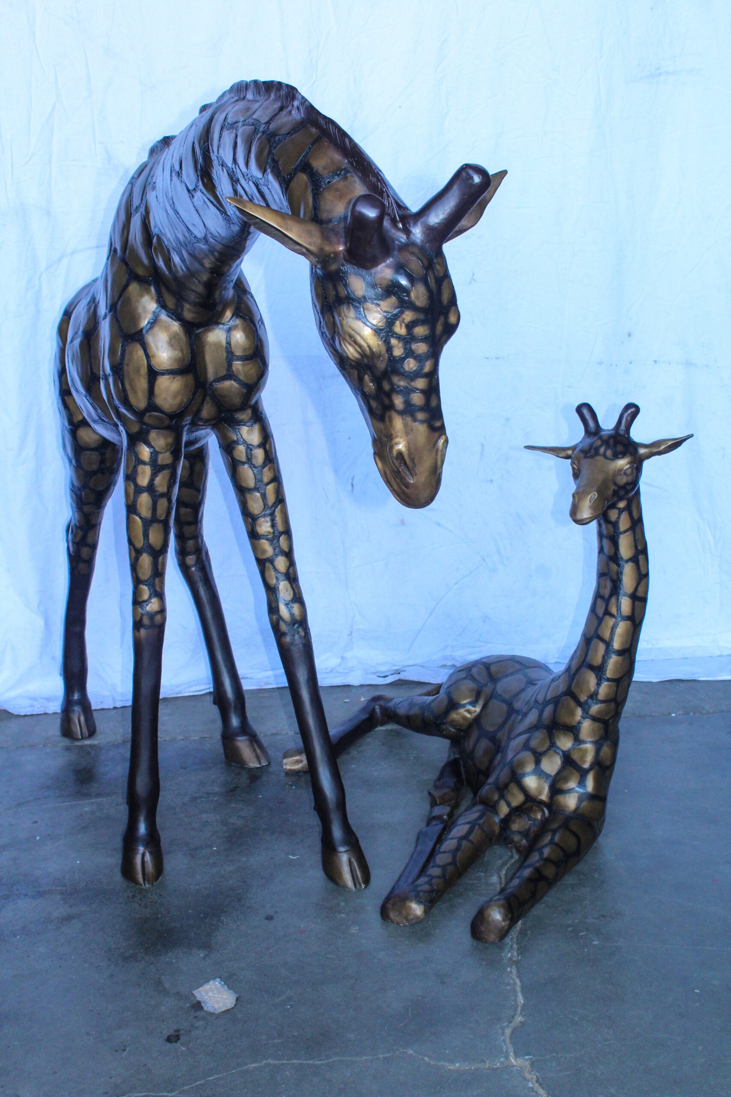 Life Size Bronze Giraffes Statues, One Laying, One Standing 77" x 21" x 58"H
