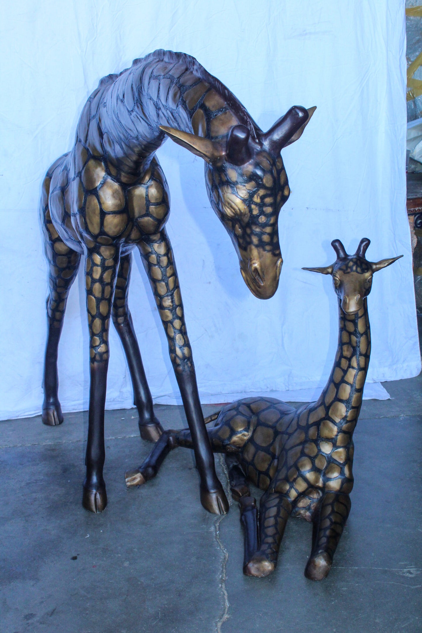 Life Size Bronze Giraffes Statues, One Laying, One Standing 77" x 21" x 58"H