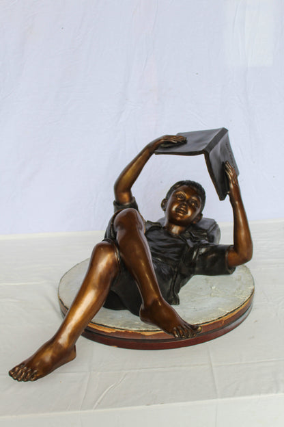 Boy Reading Bronze Statue with Book Raised Overhead 41" x 22" x 18"H