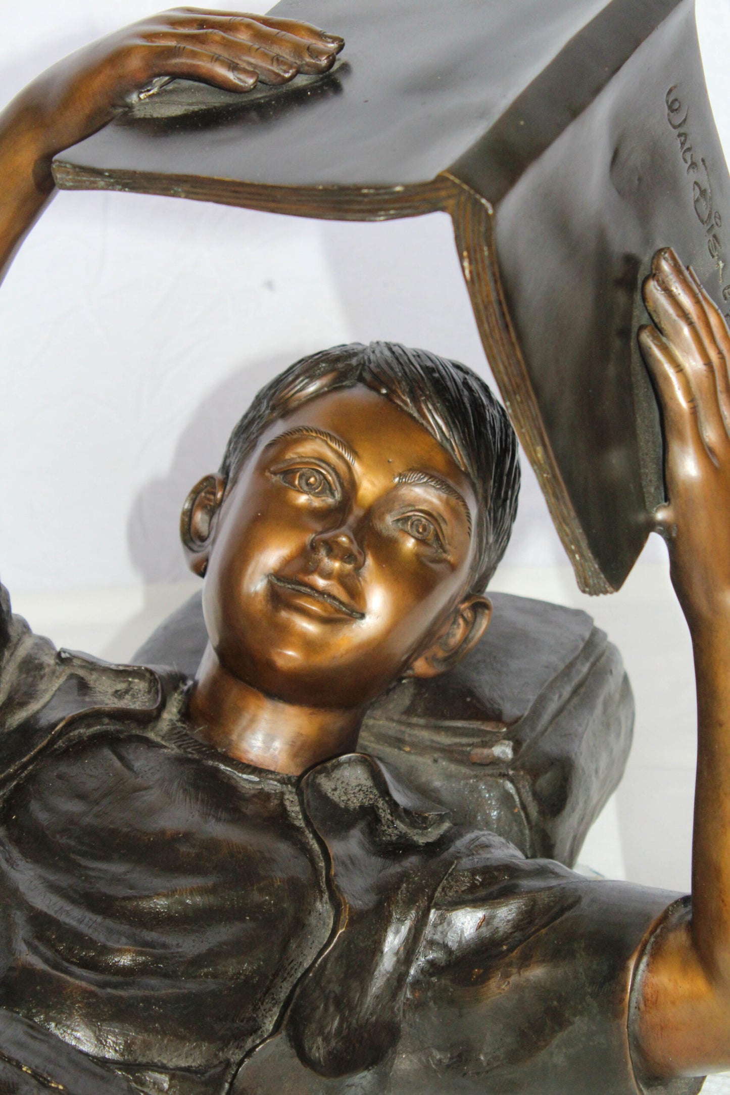 Boy Reading Bronze Statue with Book Raised Overhead 41" x 22" x 18"H