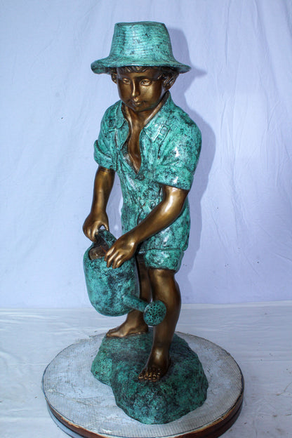Standing Boy with Watering Can Bronze Statue - Size: 15"L x 15"W x 39"H.