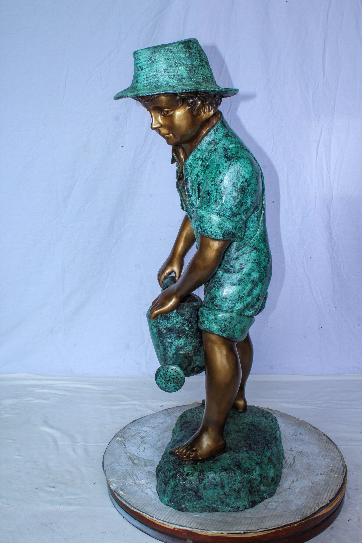Standing Boy with Watering Can Bronze Statue - Size: 15"L x 15"W x 39"H.