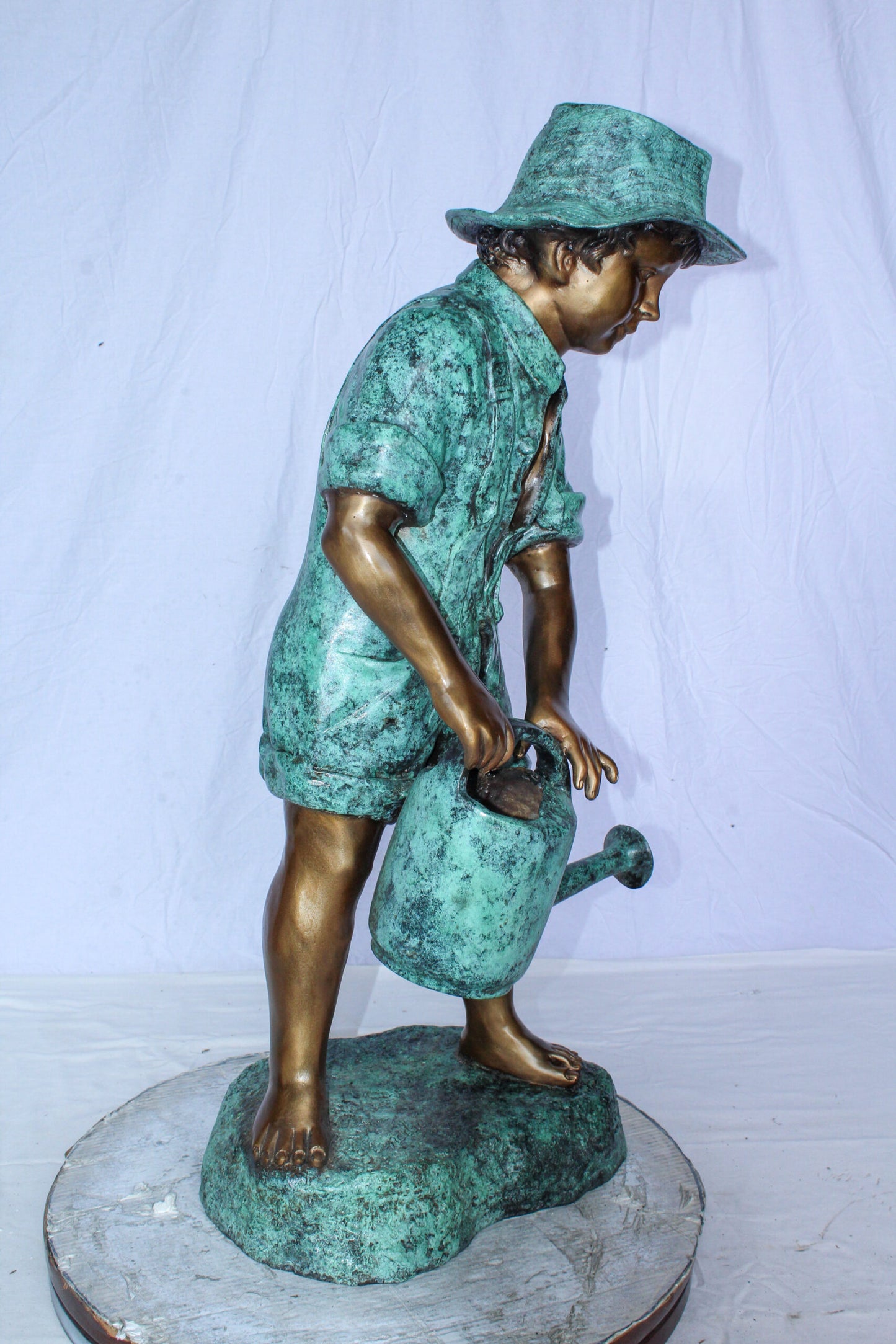Standing Boy with Watering Can Bronze Statue - Size: 15"L x 15"W x 39"H.
