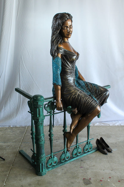 Bronze Statue of a Woman Sitting on Railing Holding a Rose 35" x 55" x 67"H