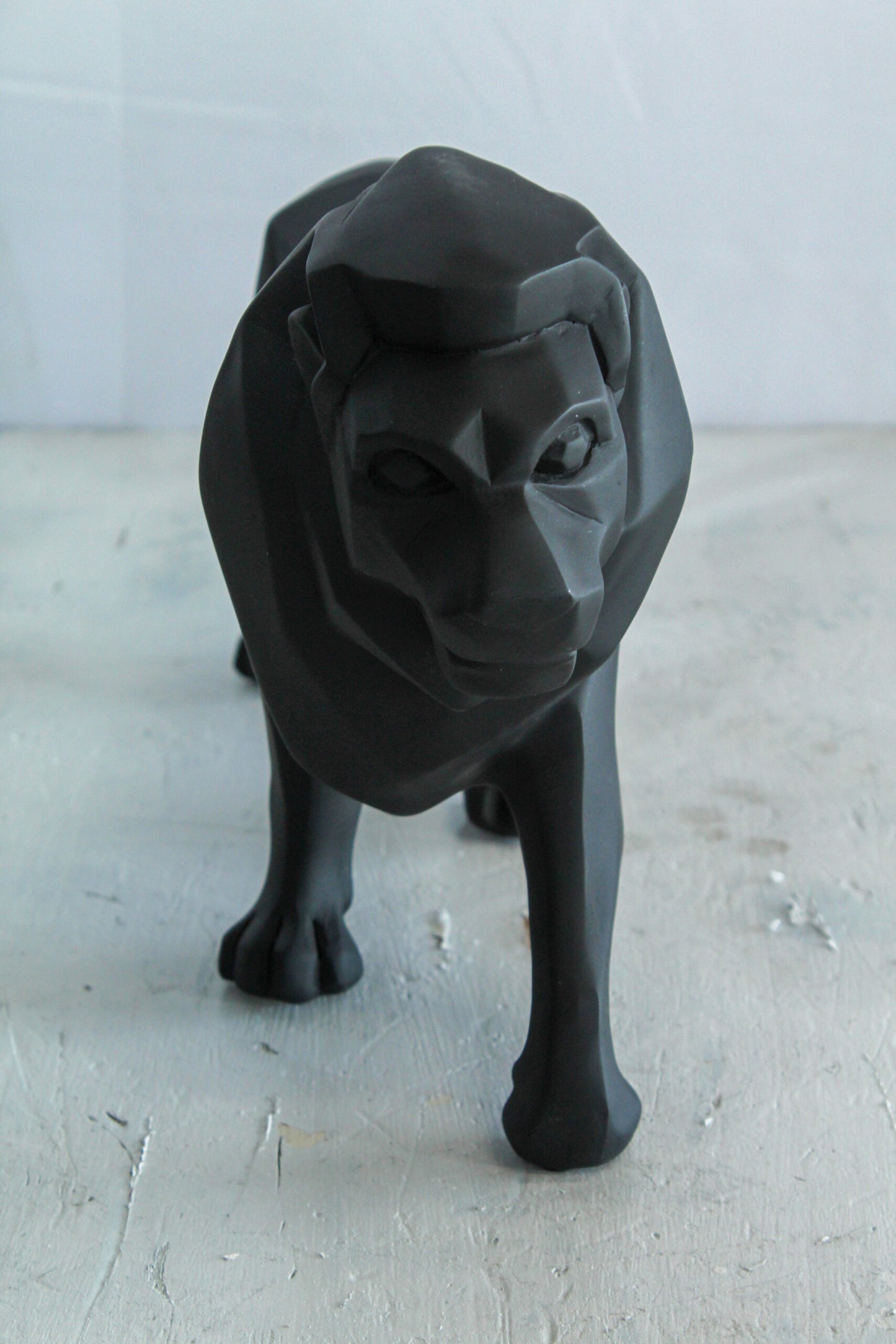 Black Resin Geometric Lion Sculpture in Modern Walking Pose   17" x 5" x 9"H