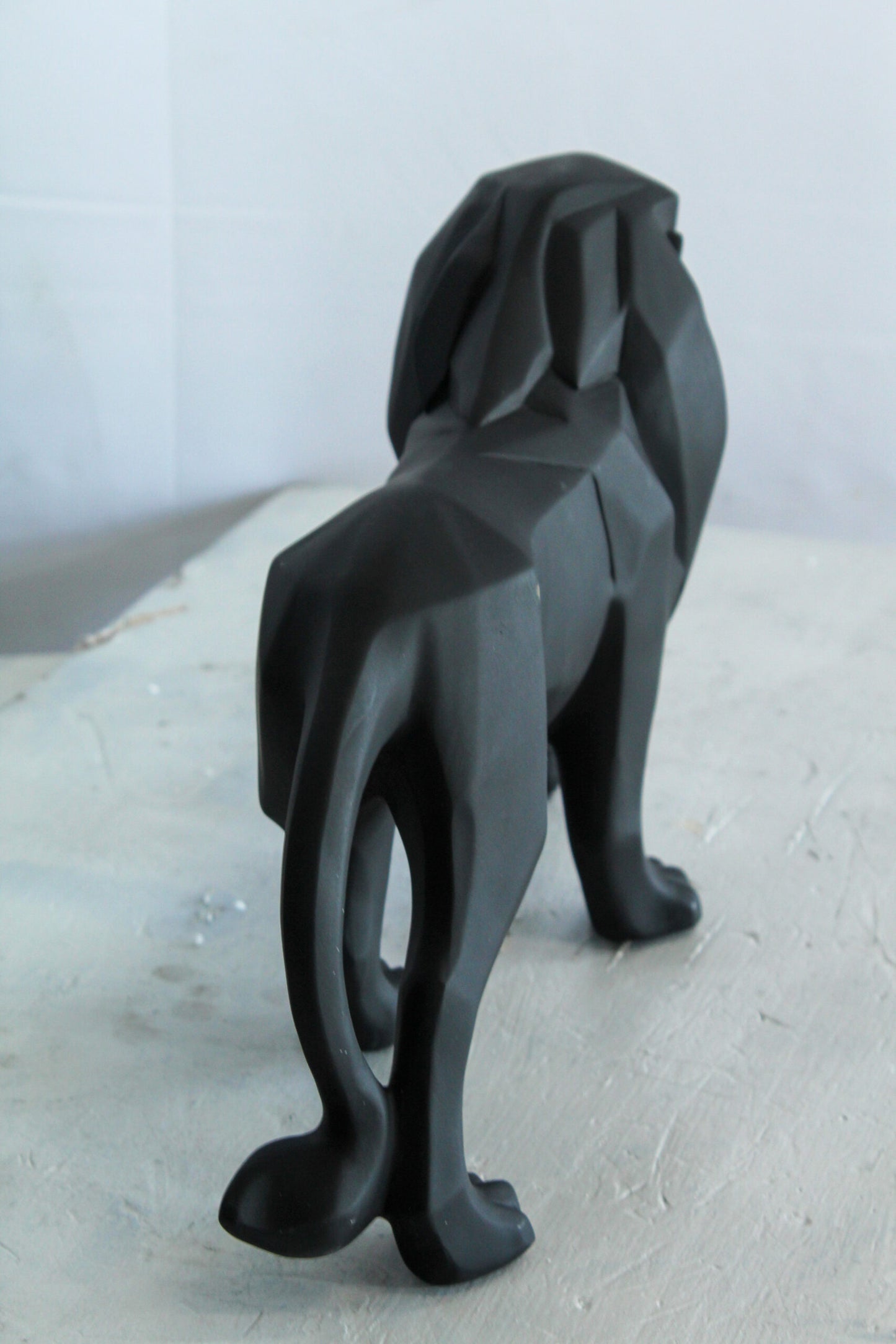 Black Resin Geometric Lion Sculpture in Modern Walking Pose   17" x 5" x 9"H