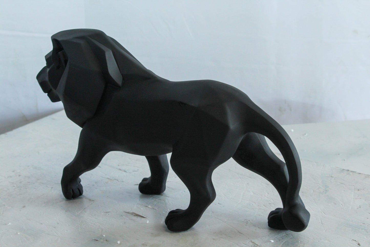 Black Resin Geometric Lion Sculpture in Modern Walking Pose   17" x 5" x 9"H