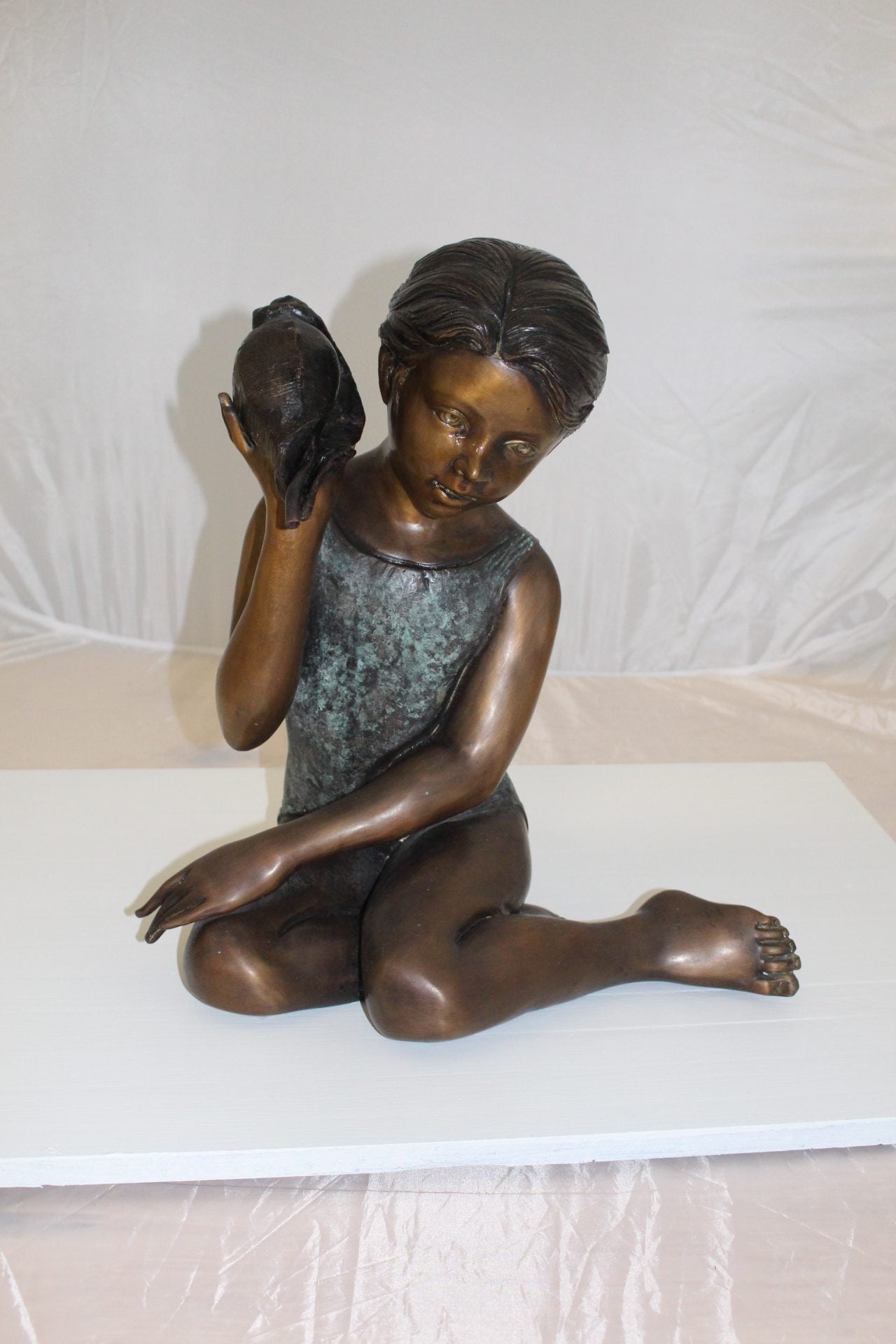 Girl listening to a Shell fountain-Bronze Statue -  Size: 17"L x 10"W x 20"H. 