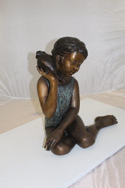Girl listening to a Shell fountain-Bronze Statue -  Size: 17"L x 10"W x 20"H. 