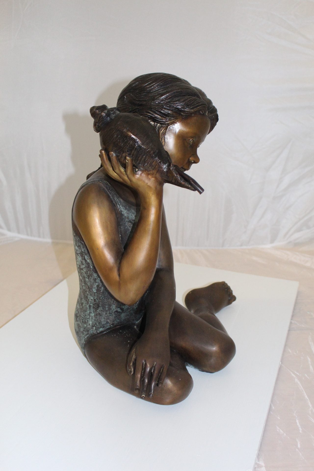 Girl listening to a Shell fountain-Bronze Statue -  Size: 17"L x 10"W x 20"H. 