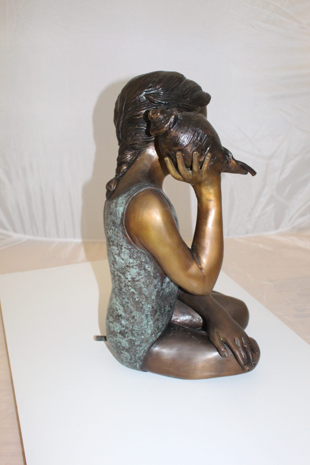 Girl listening to a Shell fountain-Bronze Statue -  Size: 17"L x 10"W x 20"H. 