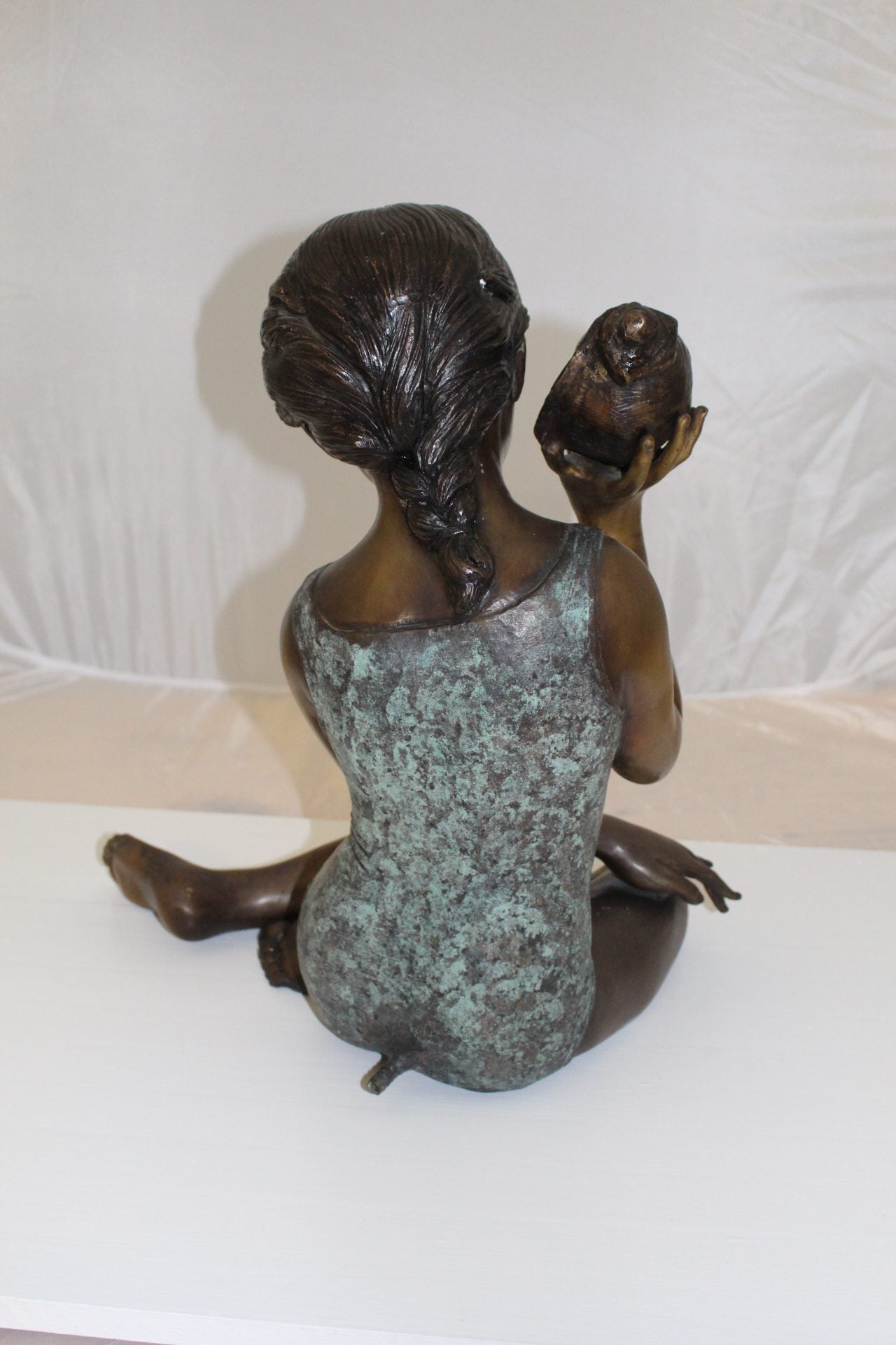Girl listening to a Shell fountain-Bronze Statue -  Size: 17"L x 10"W x 20"H. 