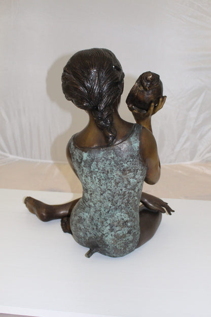 Girl listening to a Shell fountain-Bronze Statue -  Size: 17"L x 10"W x 20"H. 