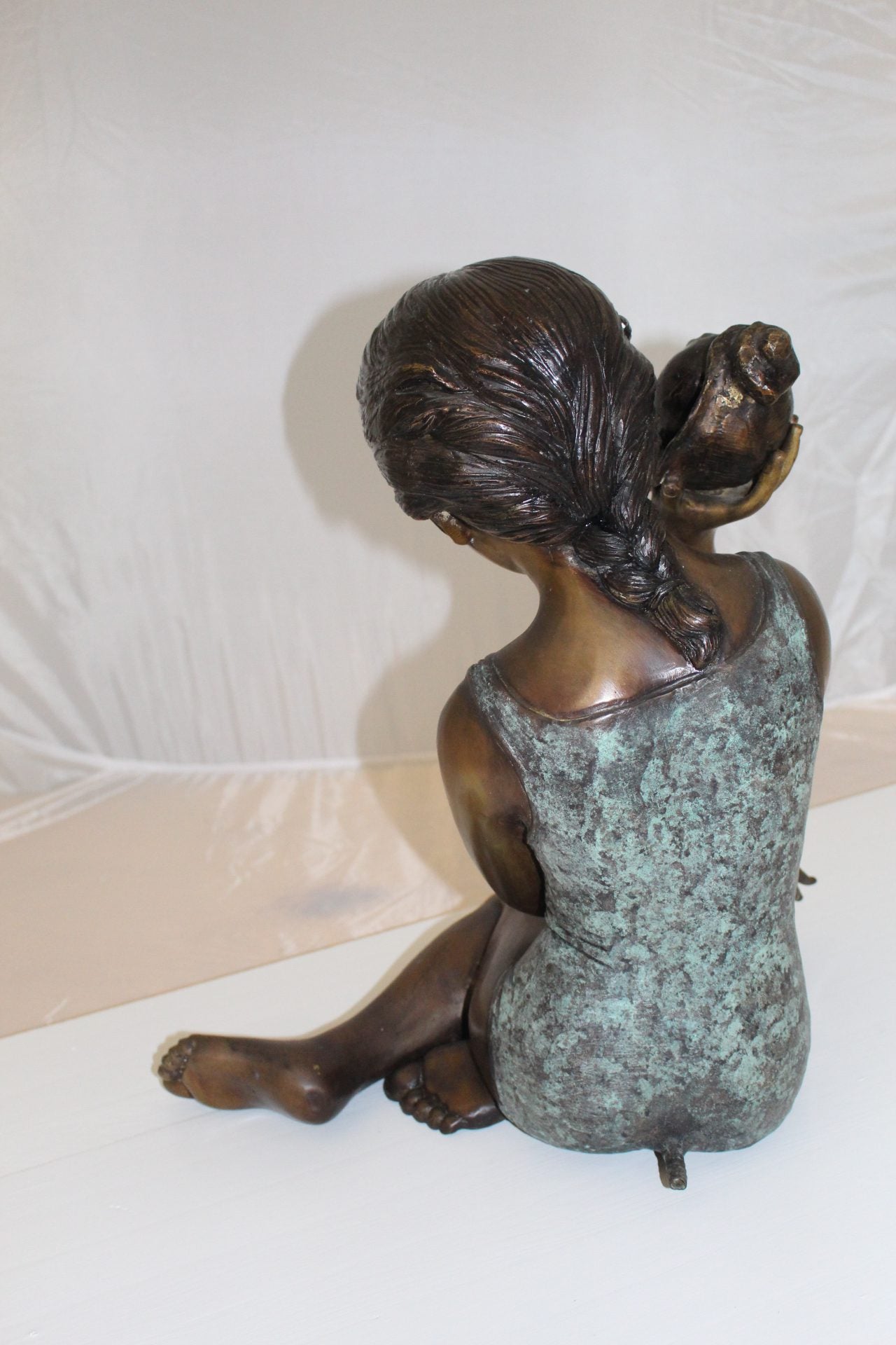 Girl listening to a Shell fountain-Bronze Statue -  Size: 17"L x 10"W x 20"H. 