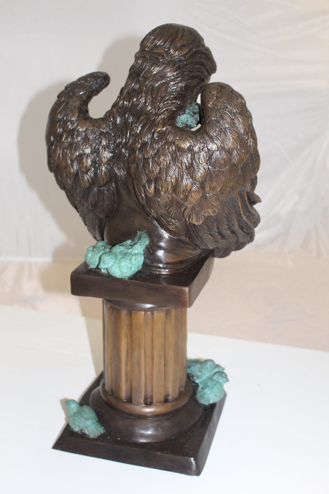 Angel sitting on Column Bronze Statue -  Size: 10"L x 9"W x 22"H. 