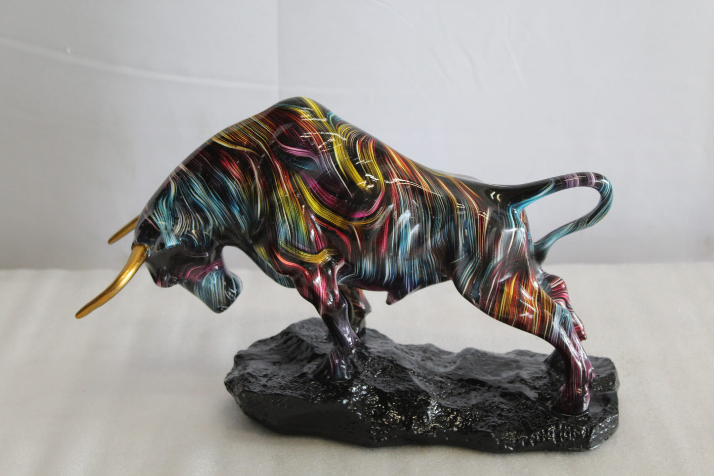 Resin Bull Statue with Swirling Multicolor Lines and Gold Horns   14" x 4" x 9"H