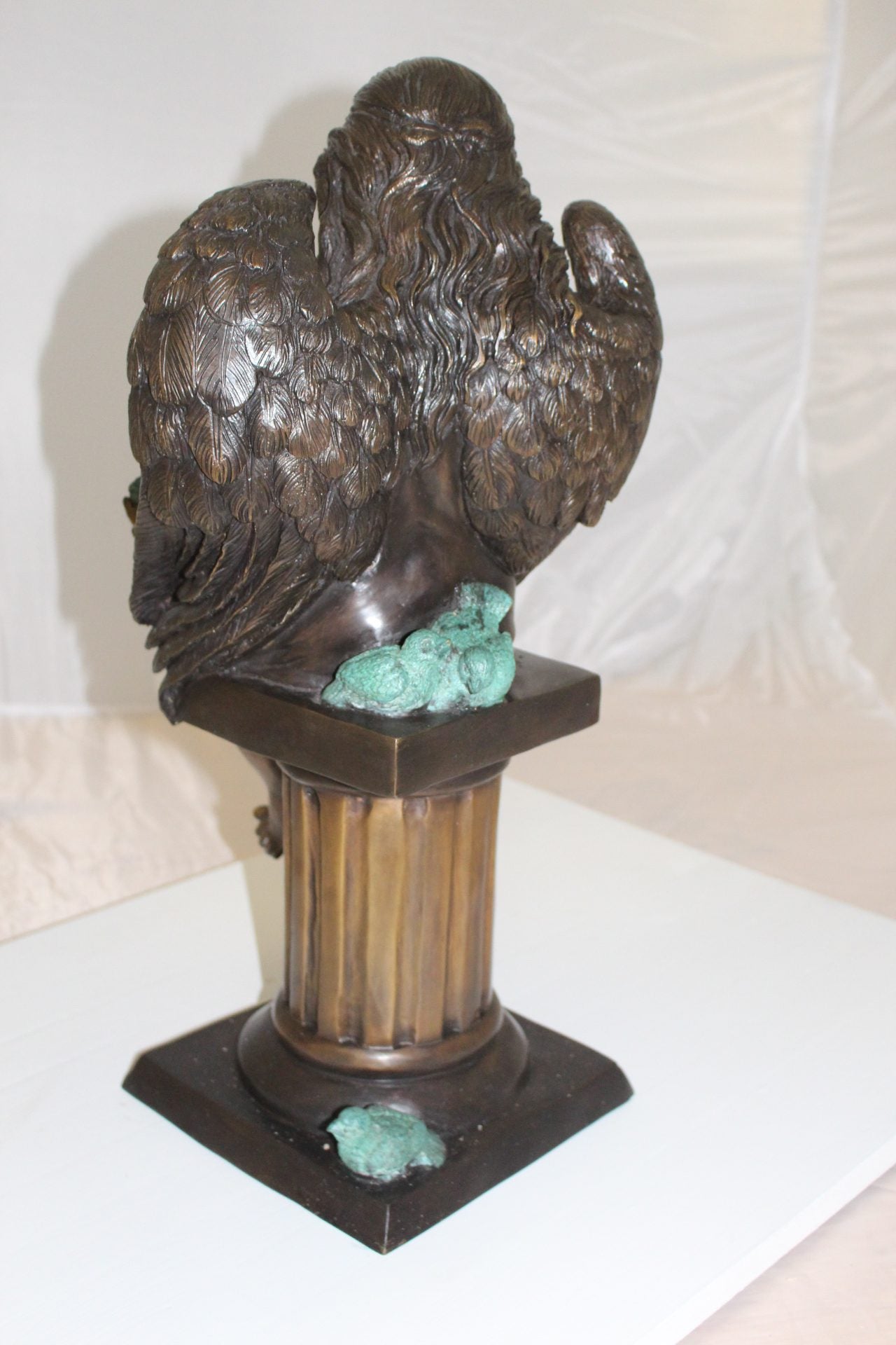 Angel sitting on Column Bronze Statue -  Size: 10"L x 9"W x 22"H. 