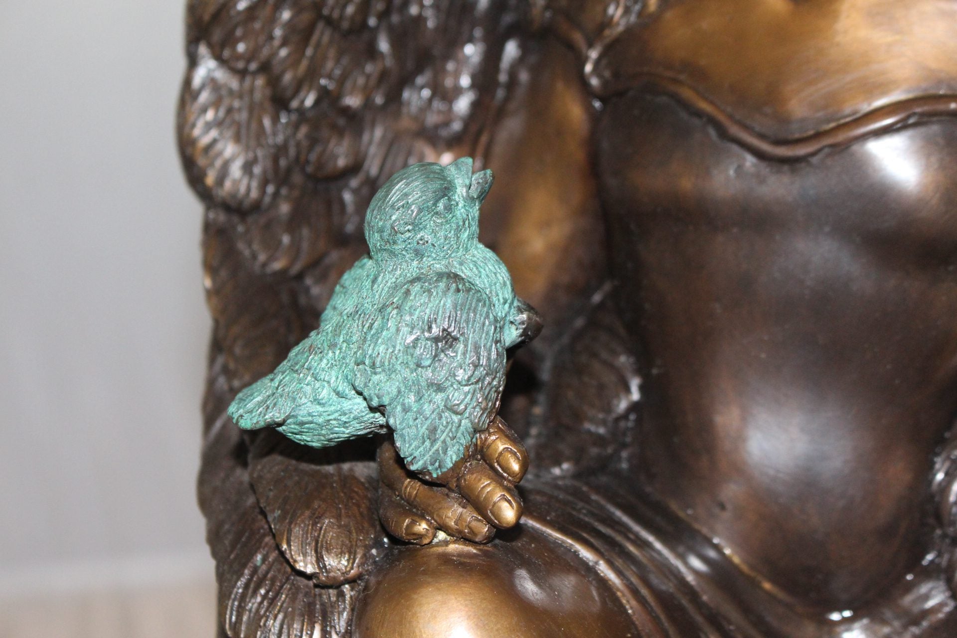 Angel sitting on Column Bronze Statue -  Size: 10"L x 9"W x 22"H. 