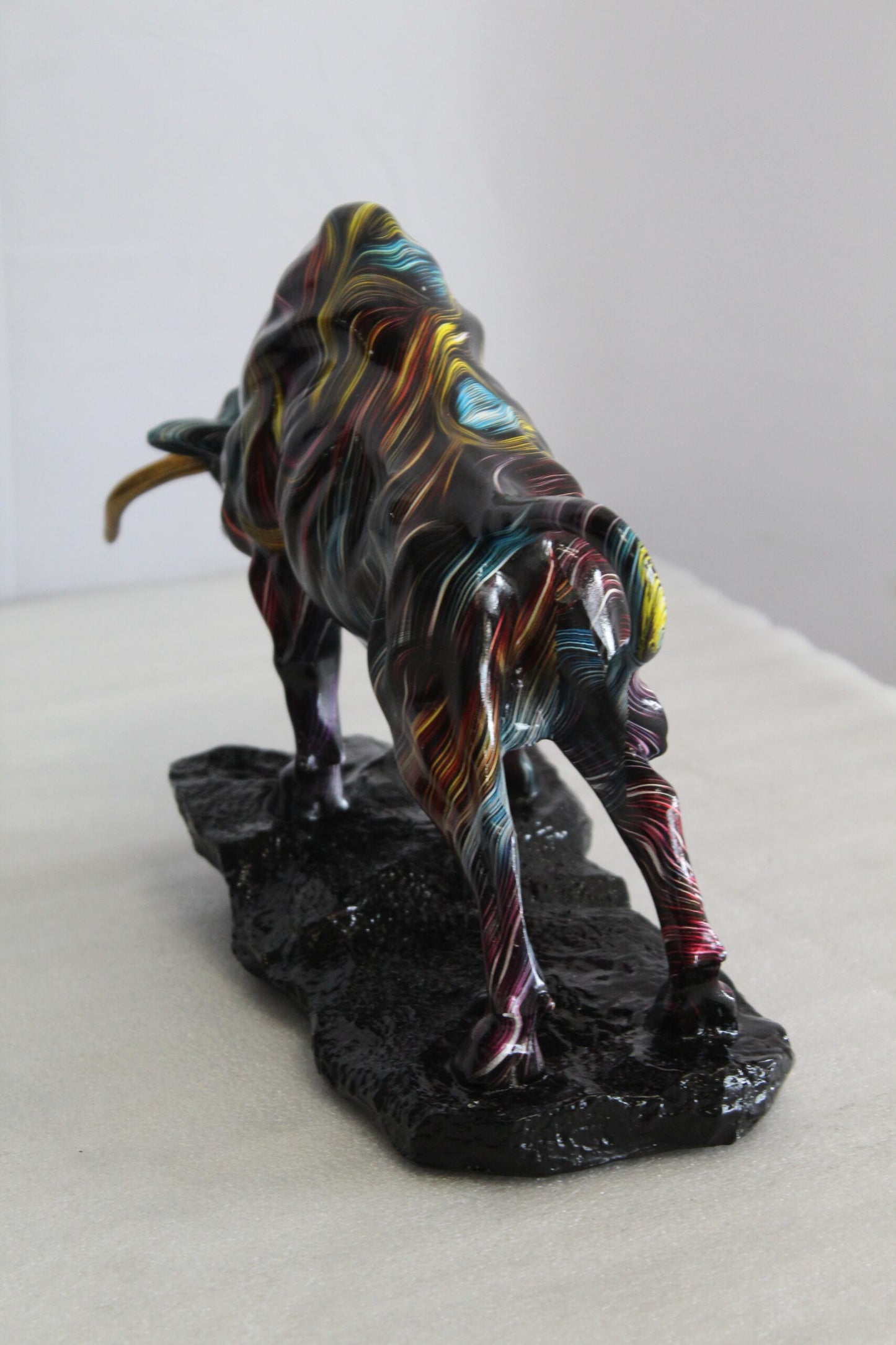 Resin Bull Statue with Swirling Multicolor Lines and Gold Horns   14" x 4" x 9"H