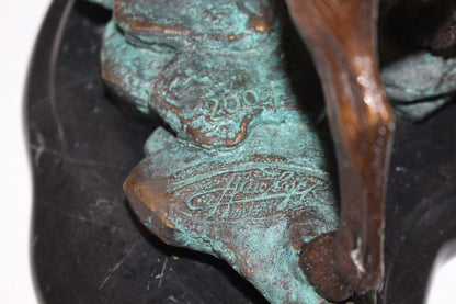 Two Rams on a rock Bronze Statue -  Size: 15"L x 8"W x 16"H. 