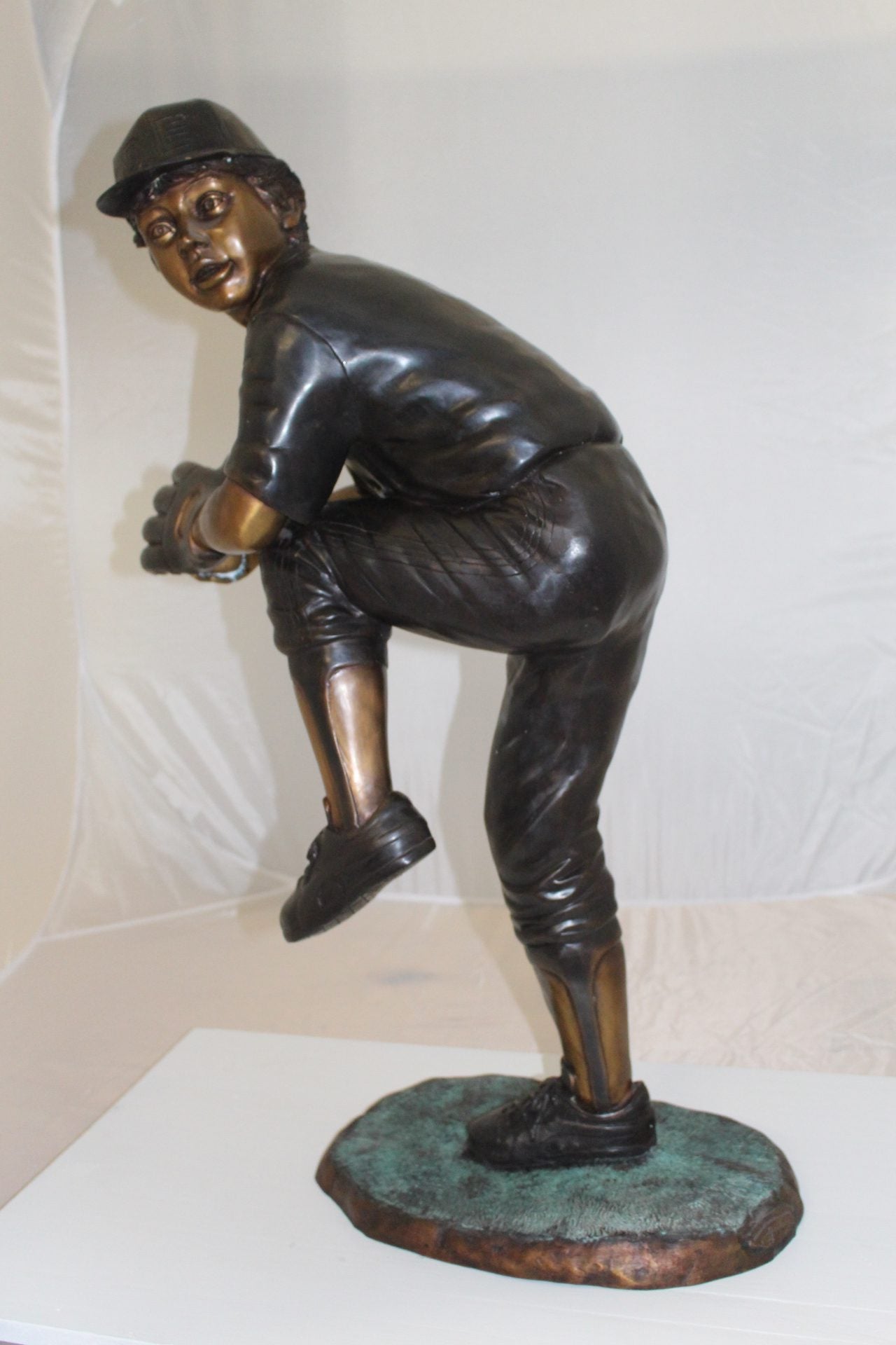 Boy plays baseball Bronze Statue -  Size: 22"L x 12"W x 36"H. 