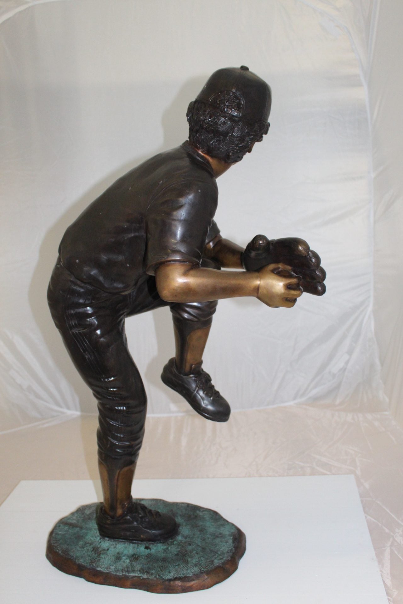 Boy plays baseball Bronze Statue -  Size: 22"L x 12"W x 36"H. 