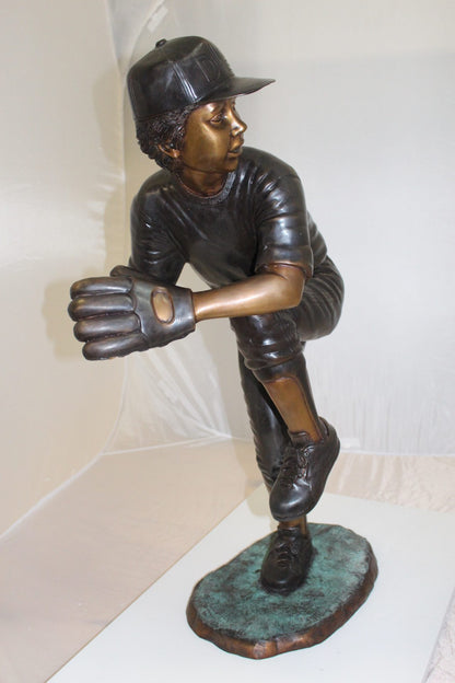 Boy plays baseball Bronze Statue -  Size: 22"L x 12"W x 36"H. 