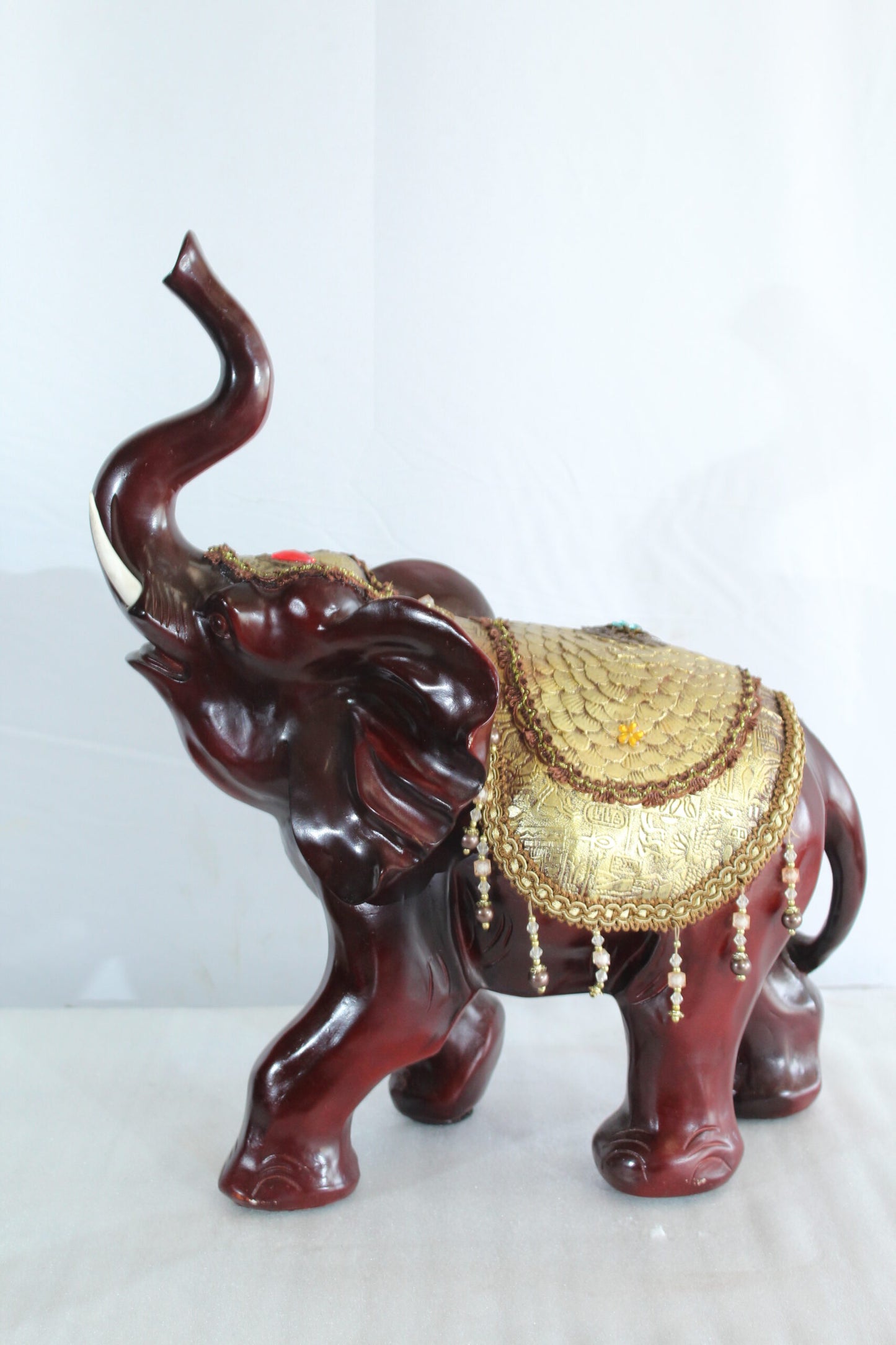 Resin Elephant Statue with Gold Saddle and Raised Trunk 19" x 10" x 22"H