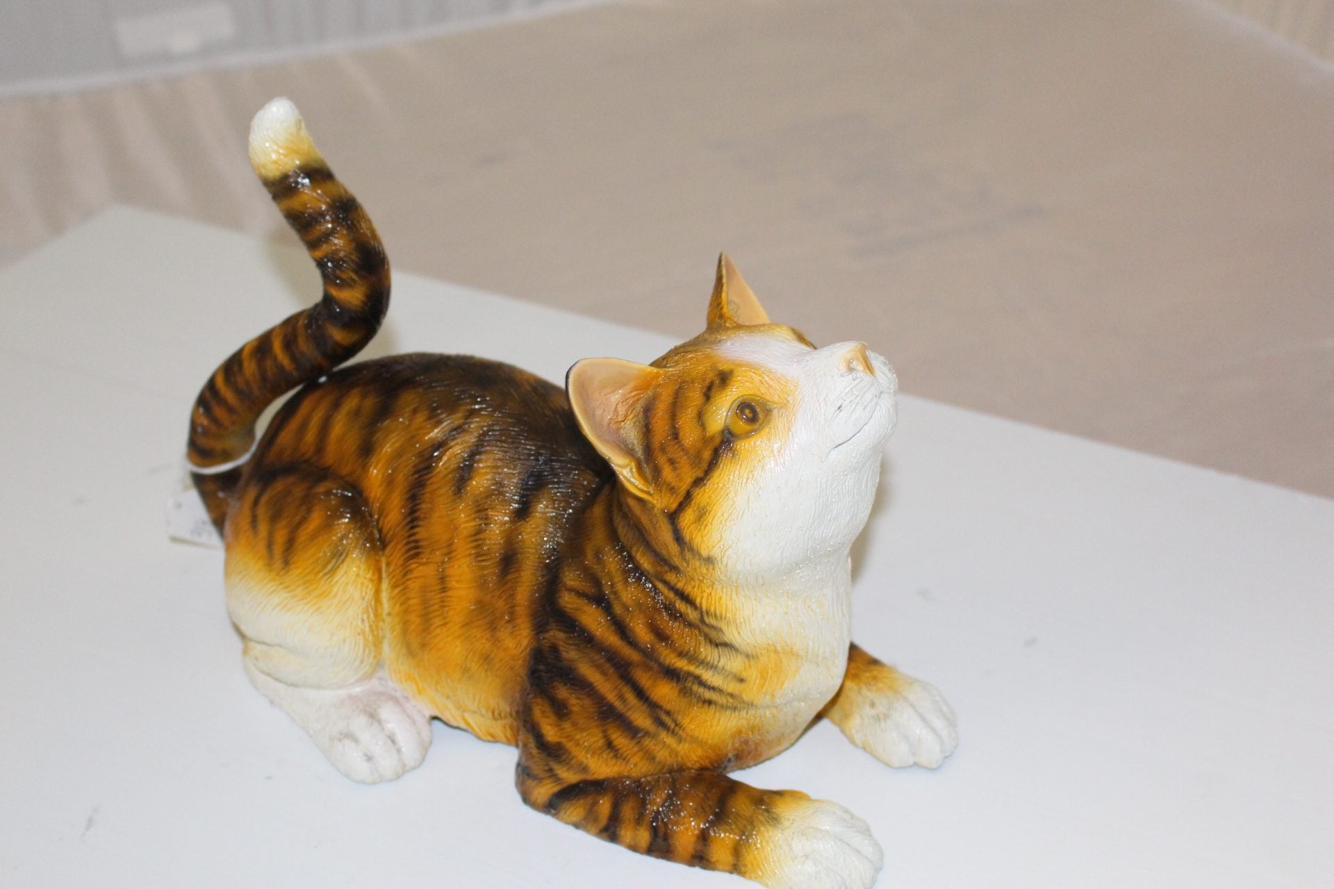 Squat cat Bronze Statue -  Size: 12"L x 6"W x 9"H. 
