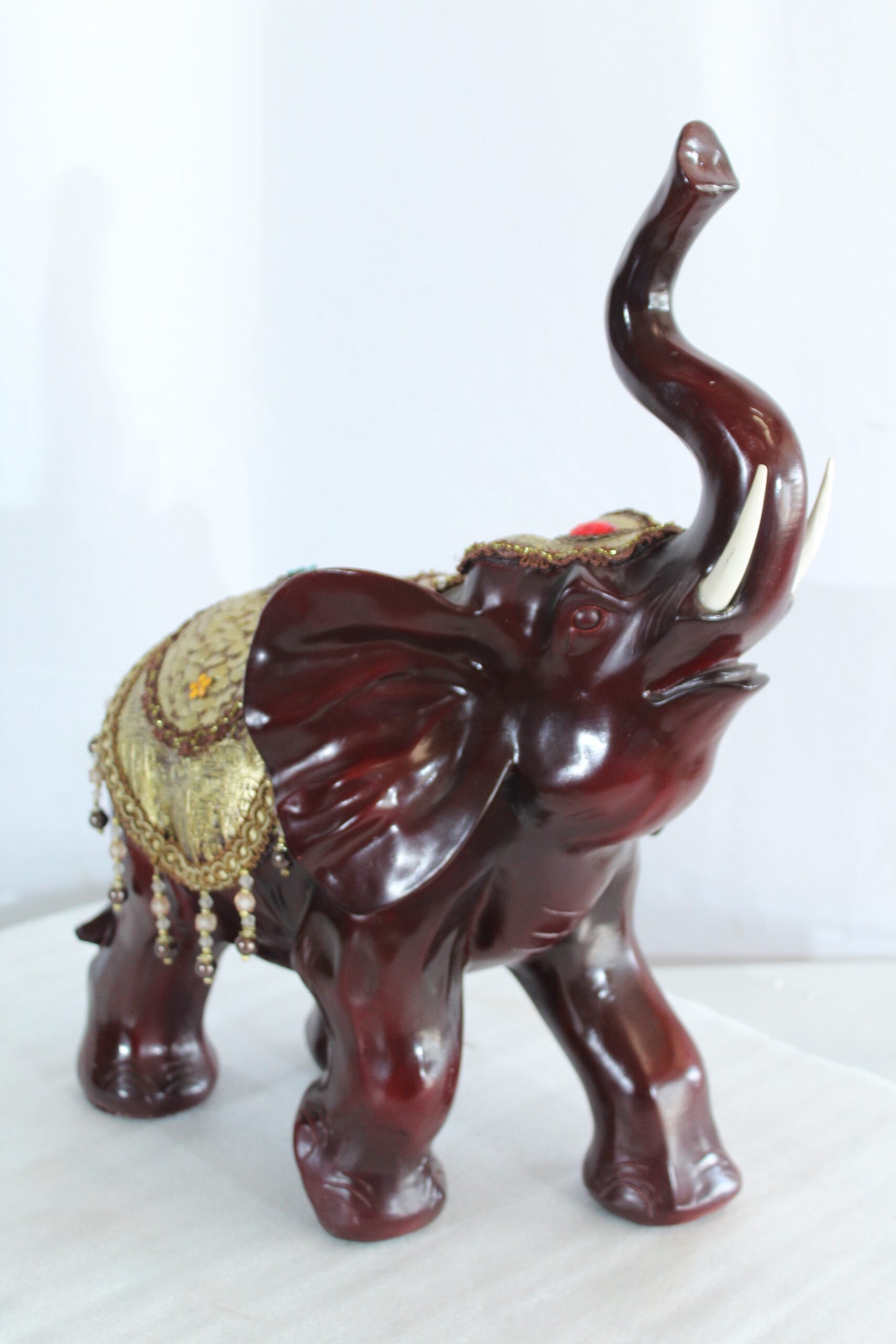 Resin Elephant Statue with Gold Saddle and Raised Trunk 19" x 10" x 22"H