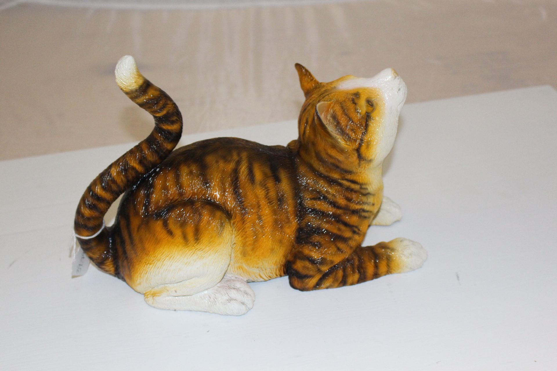 Squat cat Bronze Statue -  Size: 12"L x 6"W x 9"H. 