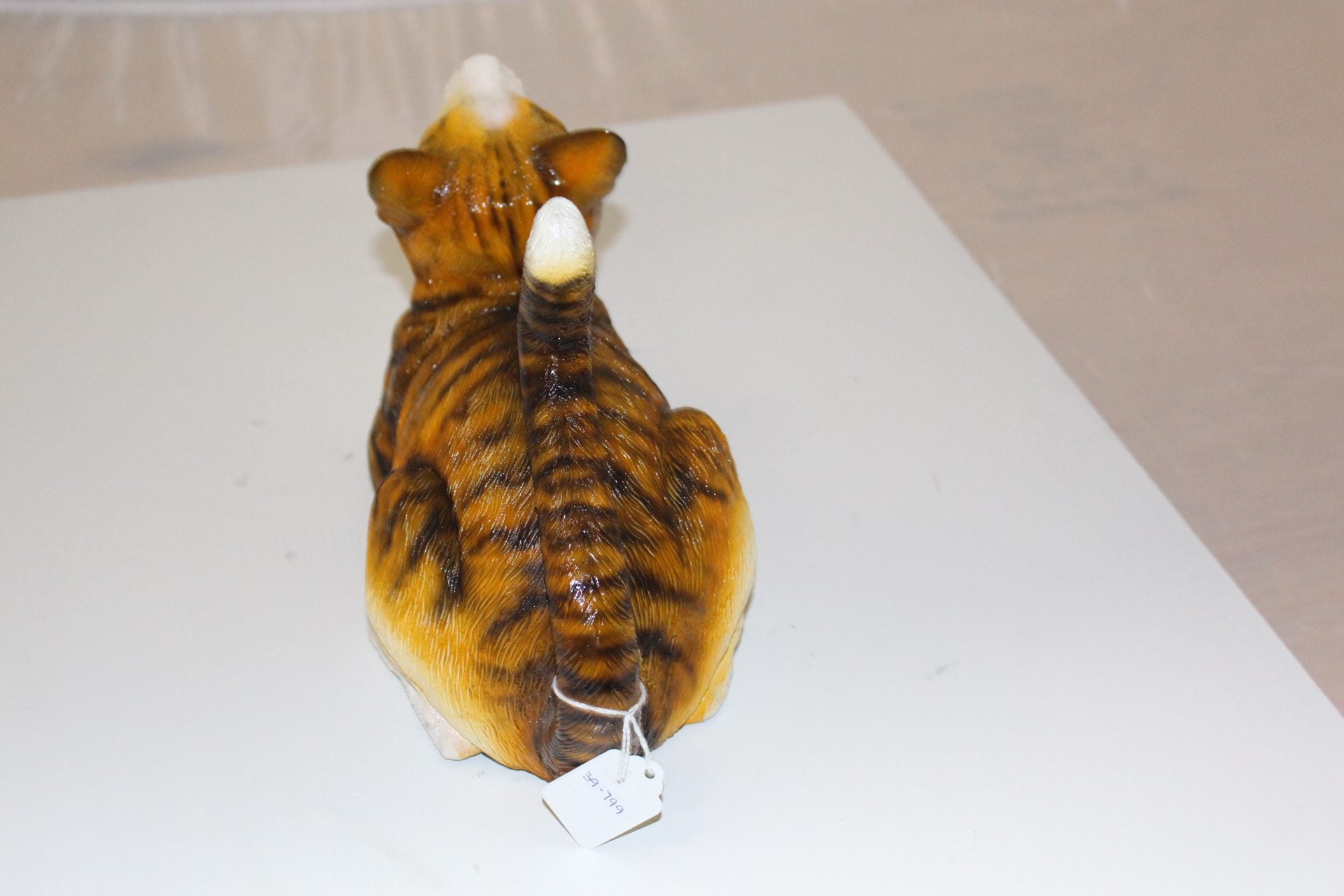 Squat cat Bronze Statue -  Size: 12"L x 6"W x 9"H. 