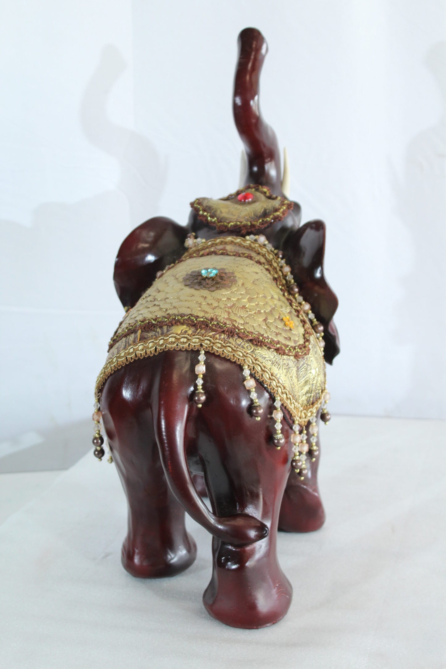 Resin Elephant Statue with Gold Saddle and Raised Trunk 19" x 10" x 22"H