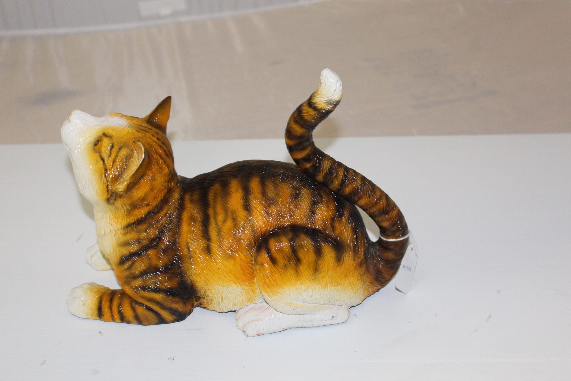 Squat cat Bronze Statue -  Size: 12"L x 6"W x 9"H. 