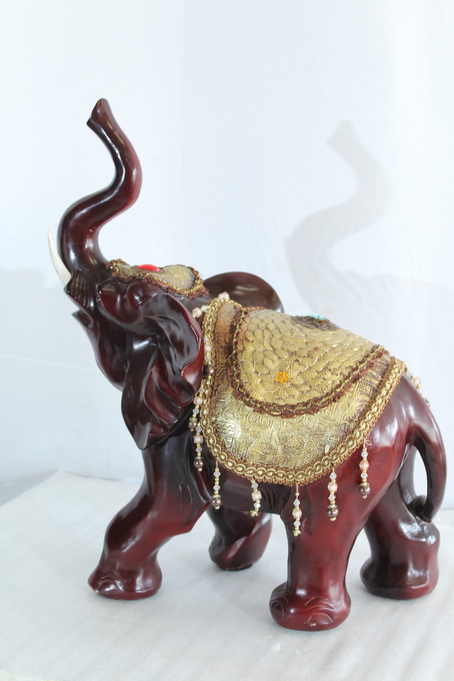 Resin Elephant Statue with Gold Saddle and Raised Trunk 19" x 10" x 22"H