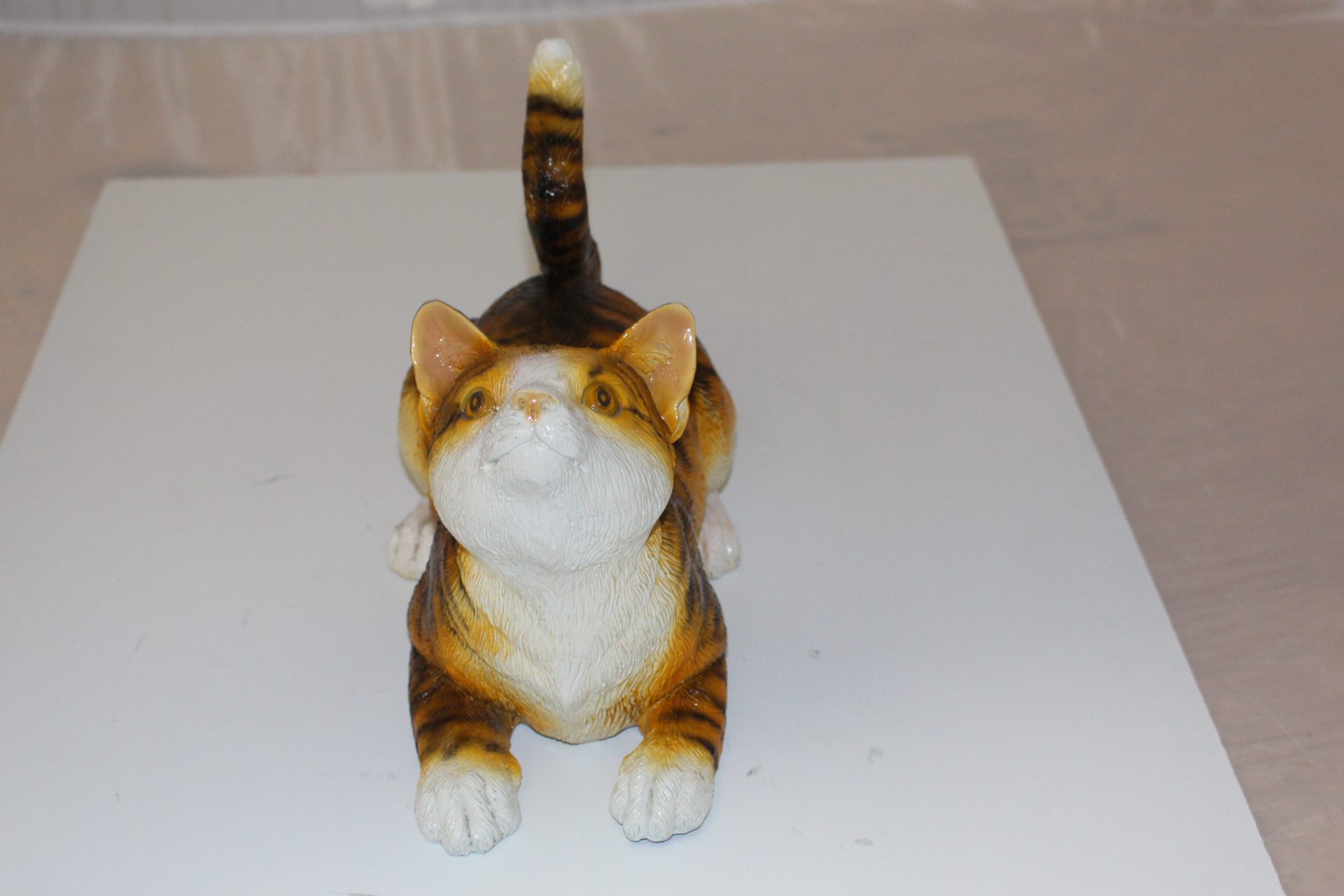 Squat cat Bronze Statue -  Size: 12"L x 6"W x 9"H. 