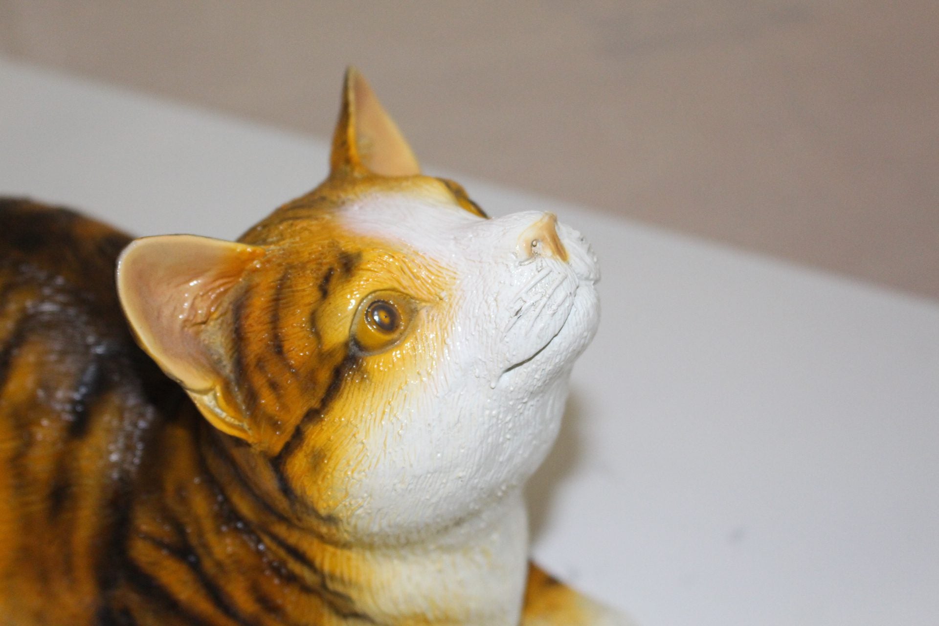 Squat cat Bronze Statue -  Size: 12"L x 6"W x 9"H. 