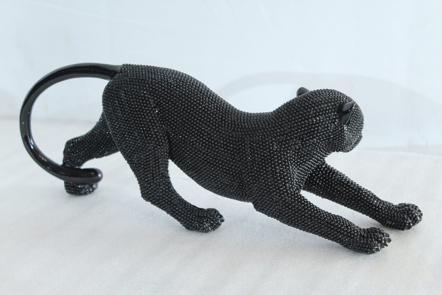 Stretching Panther Black Resin Sculpture With Bead Texture 15" x 4" x 6"H