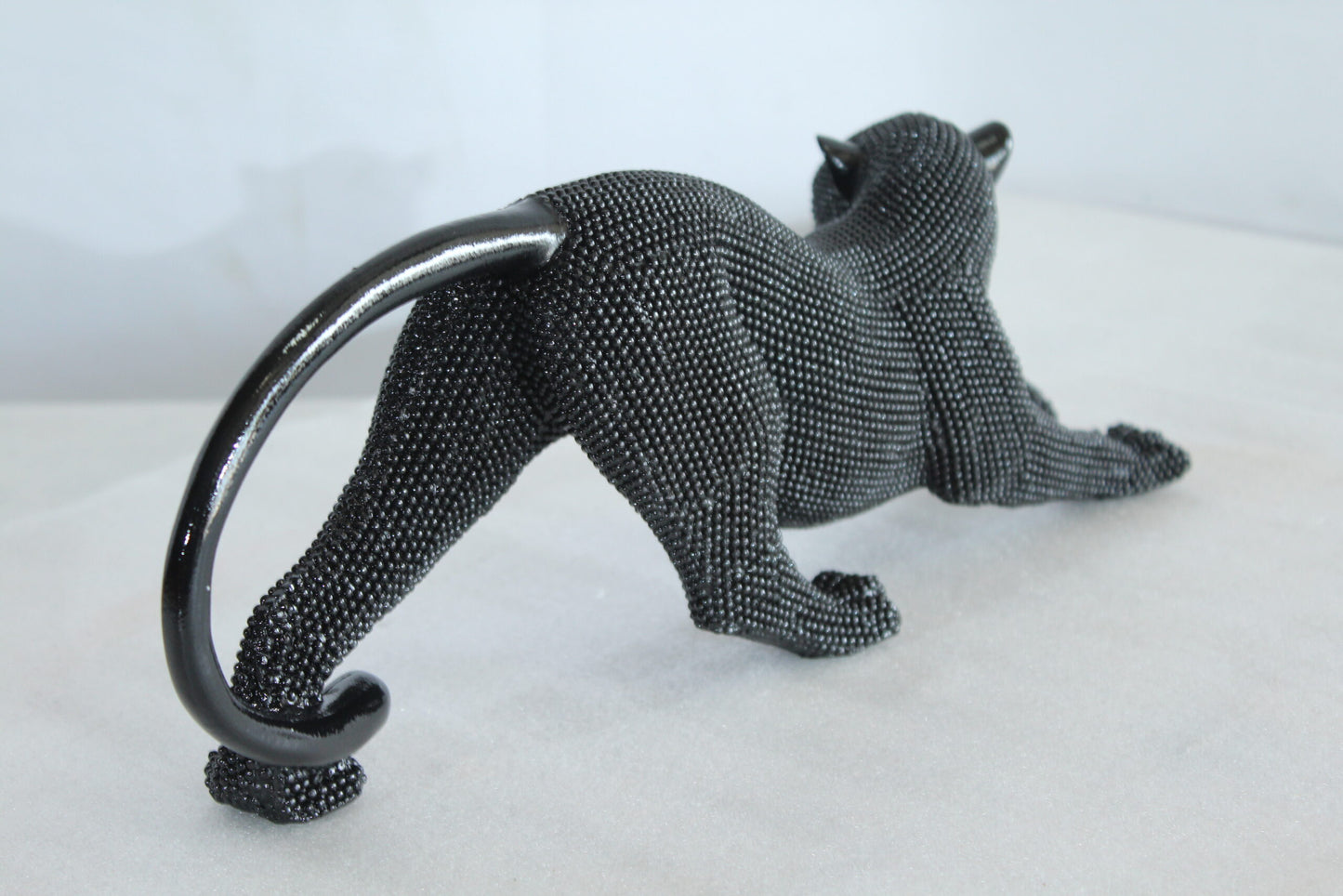 Stretching Panther Black Resin Sculpture With Bead Texture 15" x 4" x 6"H