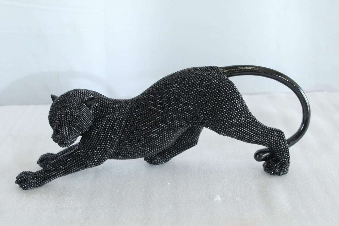 Stretching Panther Black Resin Sculpture With Bead Texture 15" x 4" x 6"H