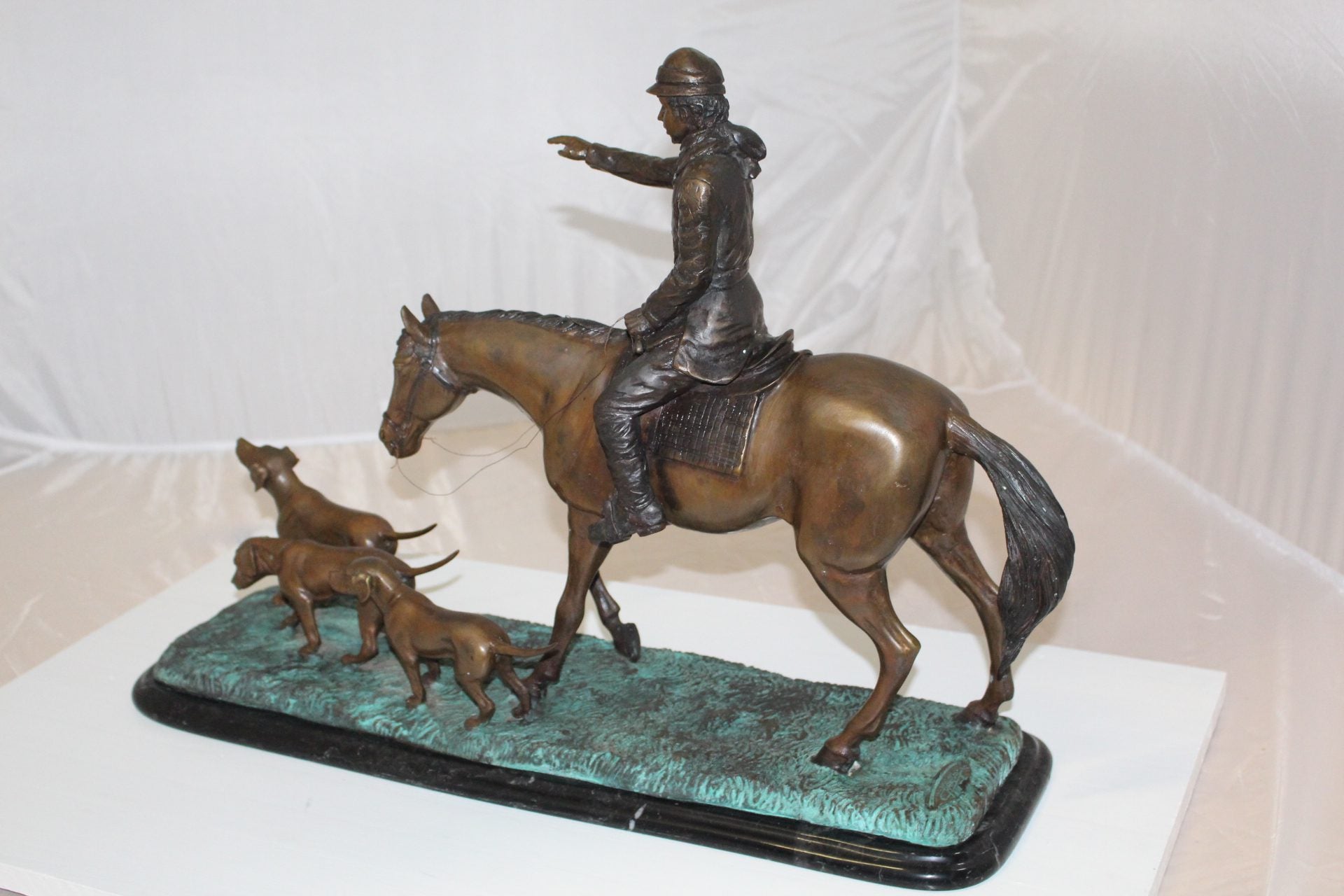 Hunter with 3 dogs Bronze Statue -  Size: 26"L x 8"W x 19"H. 