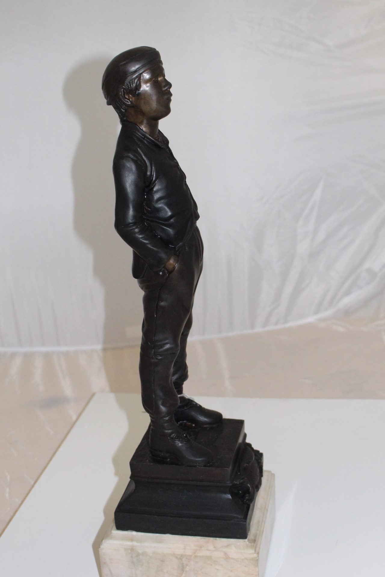 Boy standing Bronze Statue -  Size: 7.5"L x 7.5"W x 23.5"H. 