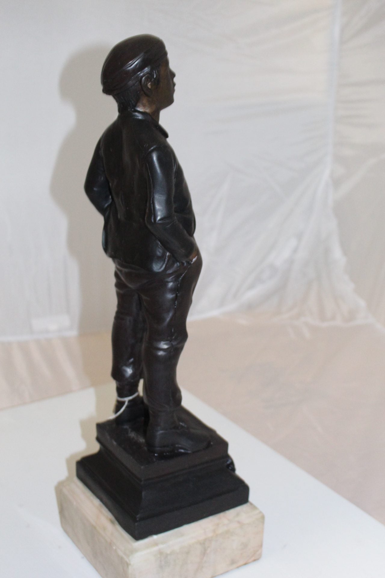 Boy standing Bronze Statue -  Size: 7.5"L x 7.5"W x 23.5"H. 