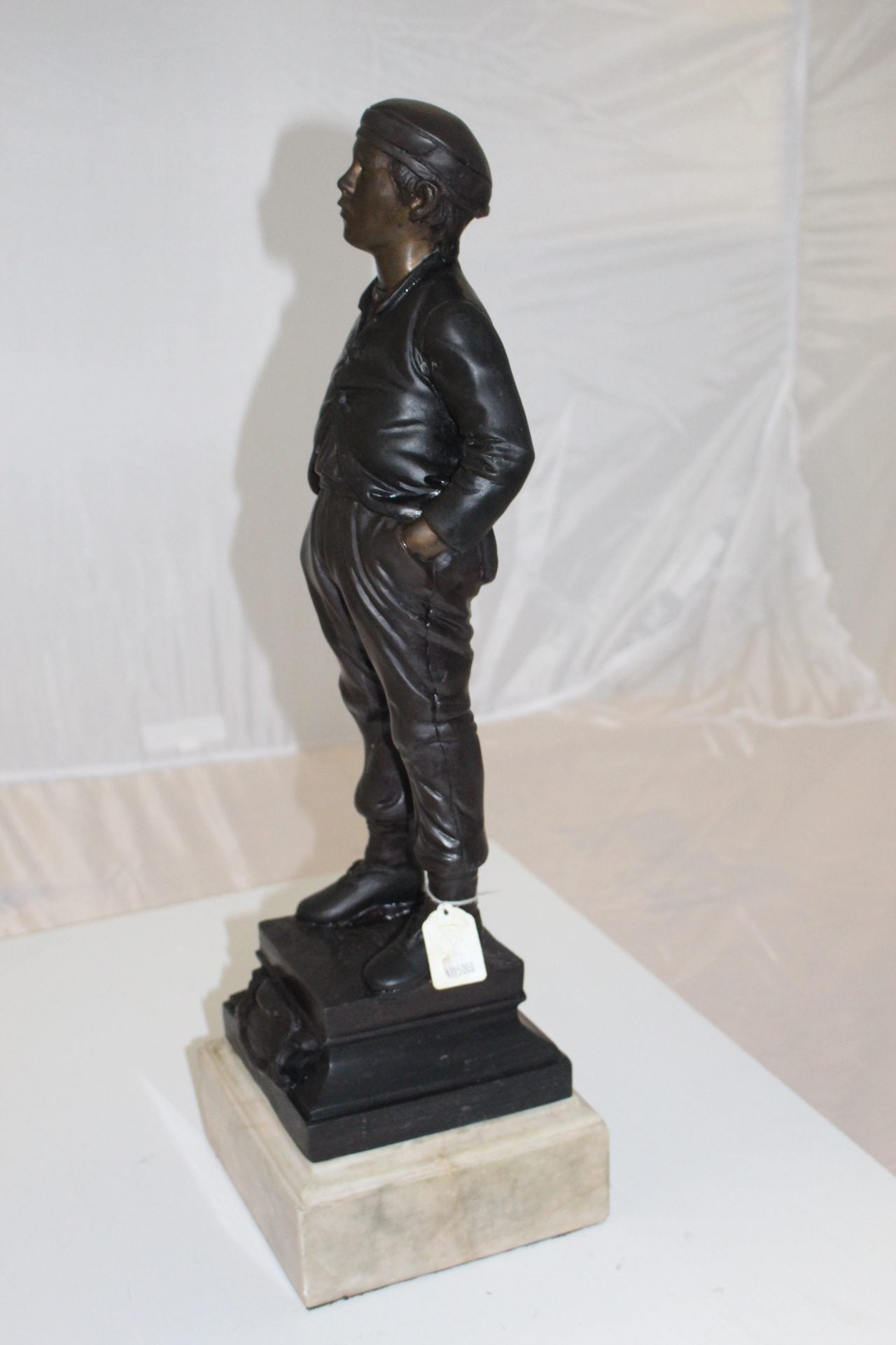 Boy standing Bronze Statue -  Size: 7.5"L x 7.5"W x 23.5"H. 