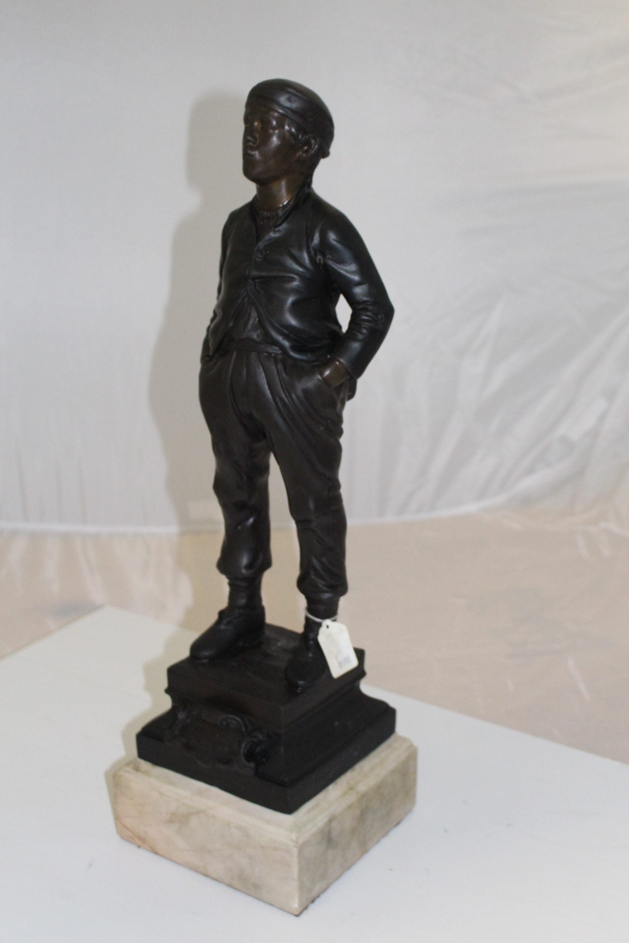 Boy standing Bronze Statue -  Size: 7.5"L x 7.5"W x 23.5"H. 